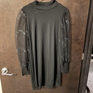 Mock neck black dress.